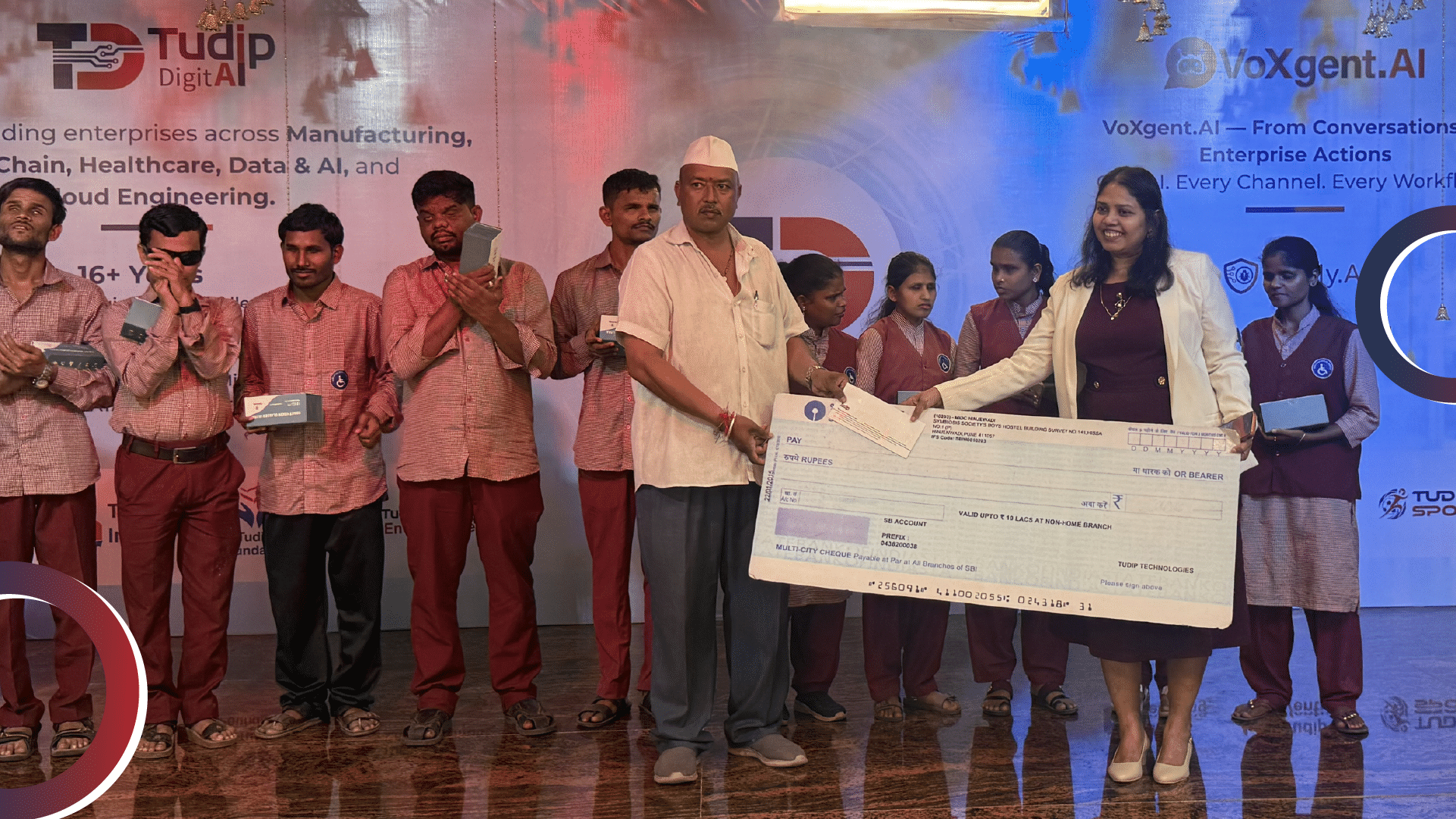 Tudip Digital team presenting the Smart Vision Glasses donation